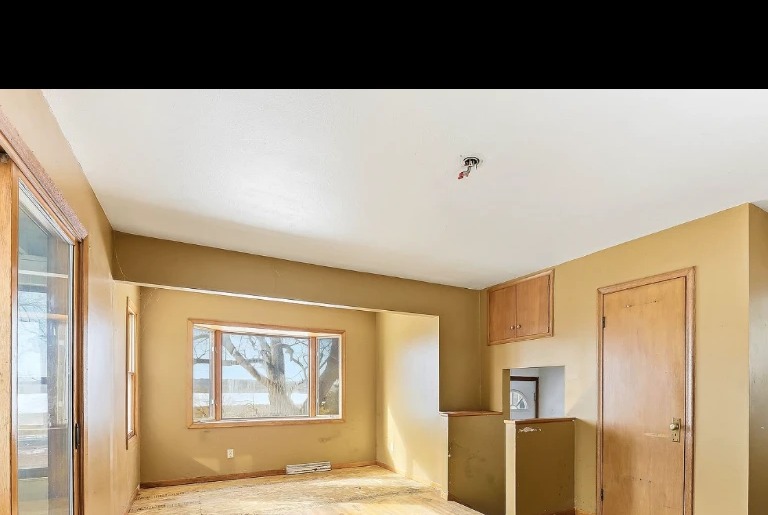 Original dining and rear living space
